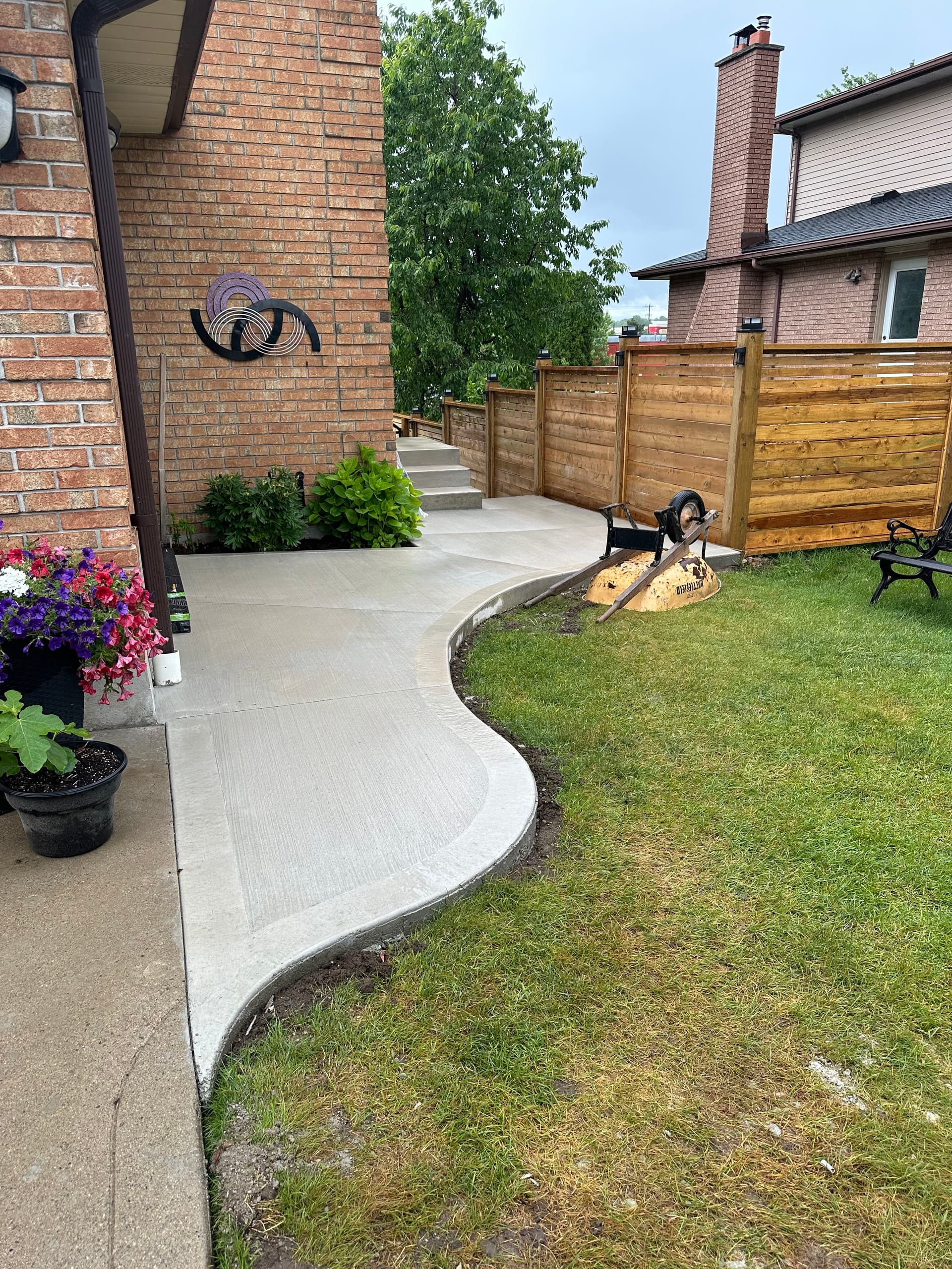 Guelph Home Gets Beautiful Curved Concrete Walkway image