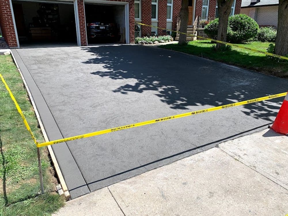 Natural Stamp Concrete Driveway with Wide Border in Guelph image